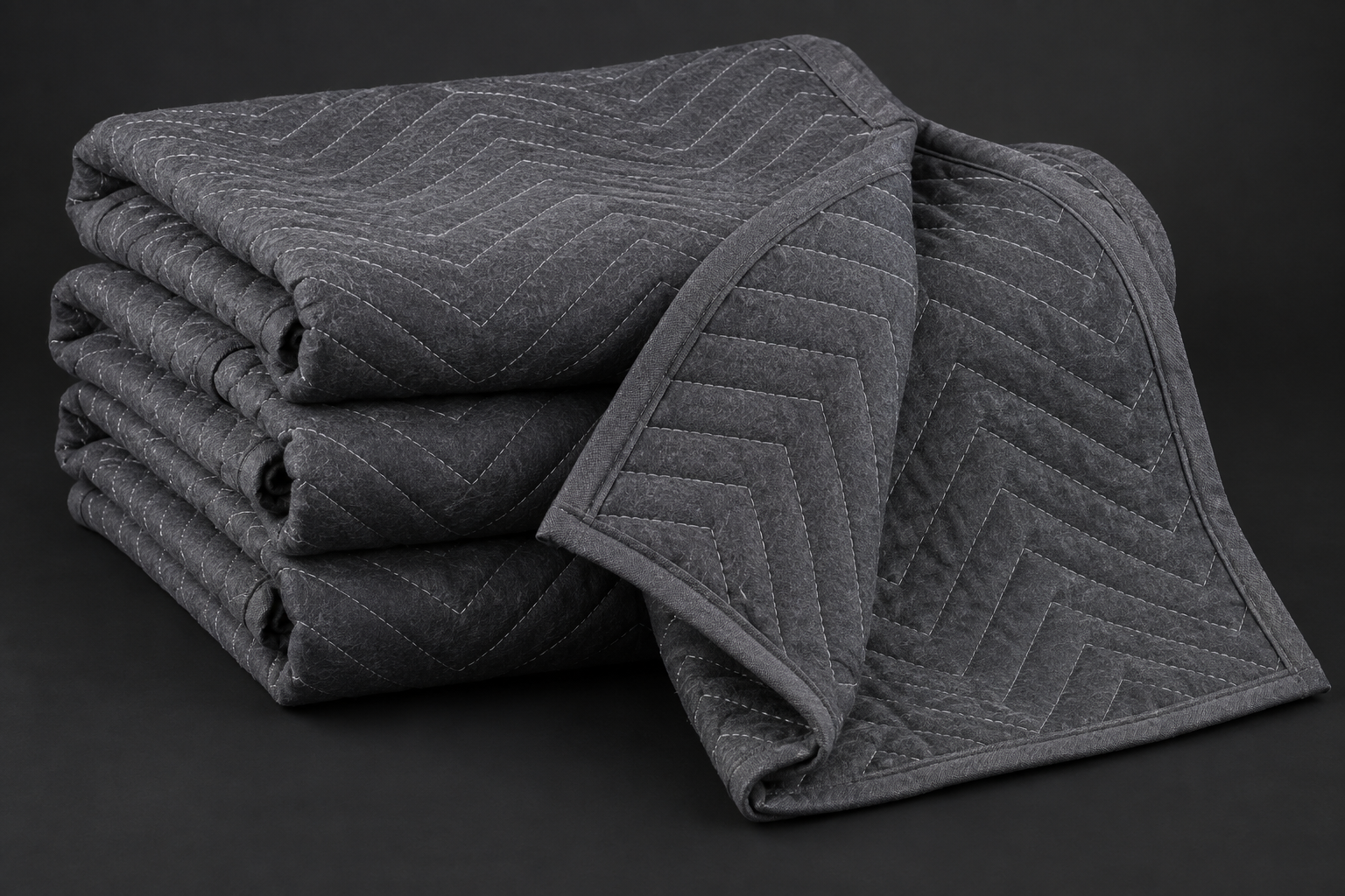 Illustration of folded quilted moving blankets